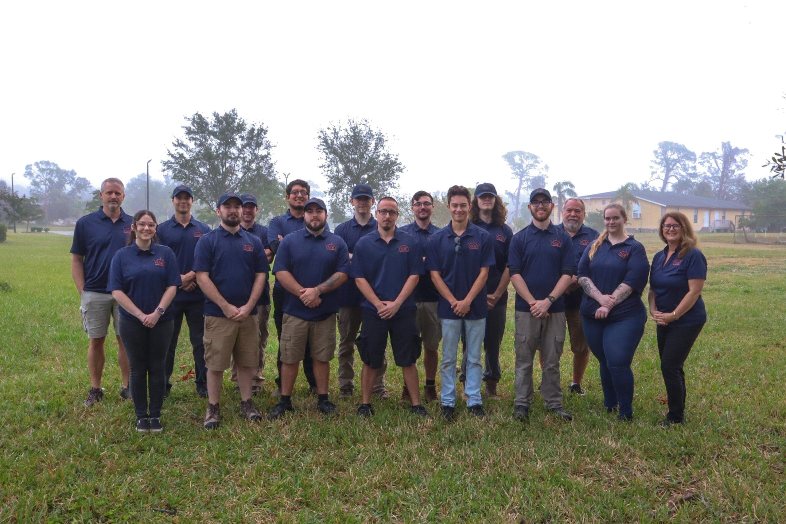 New Dawn Electric team gathered outdoors