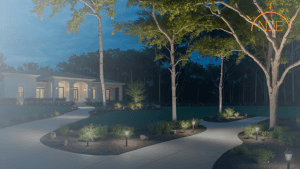 Modern house in Sarasota with landscape lighting at dusk: guide to selecting outdoor fixtures.