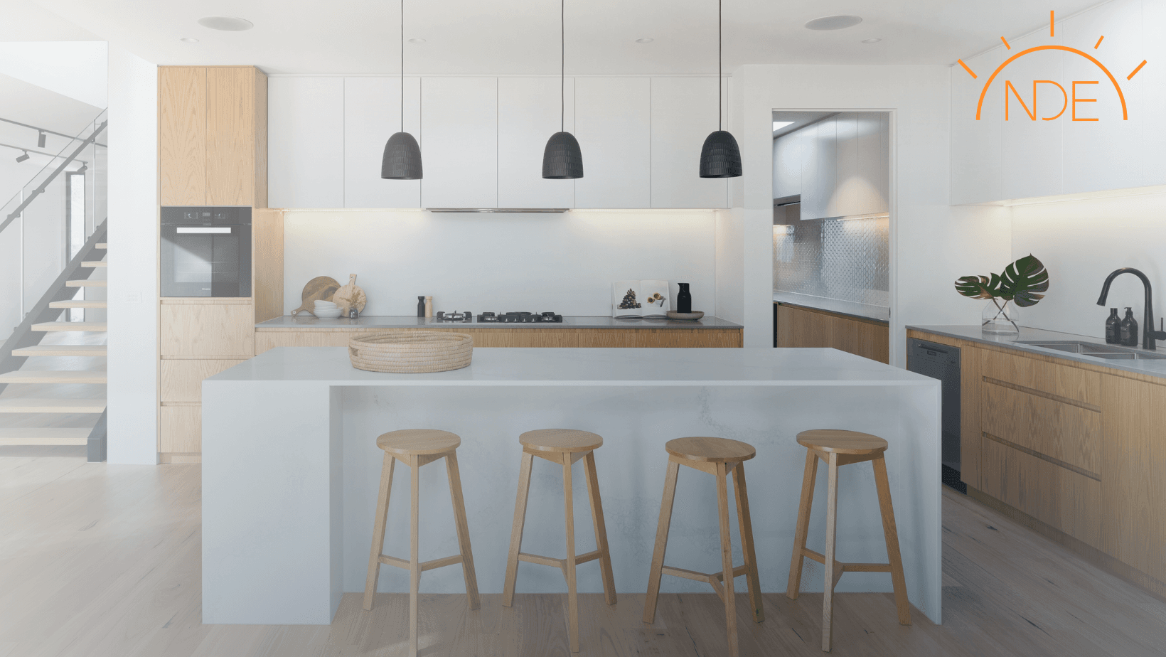 Modern kitchen in Bradenton with 2024 remodeling trends focusing on lighting and electrical circuit innovations by New Dawn Electric.